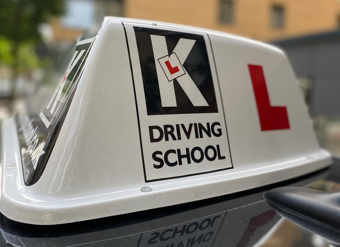 K Driving School Roof Sign